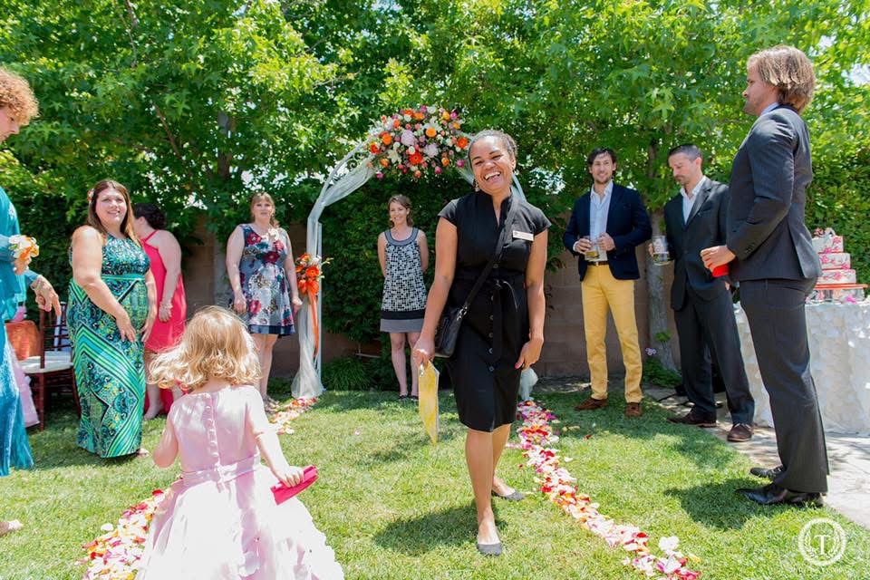 Josy coordinating an outdoor wedding ceremony